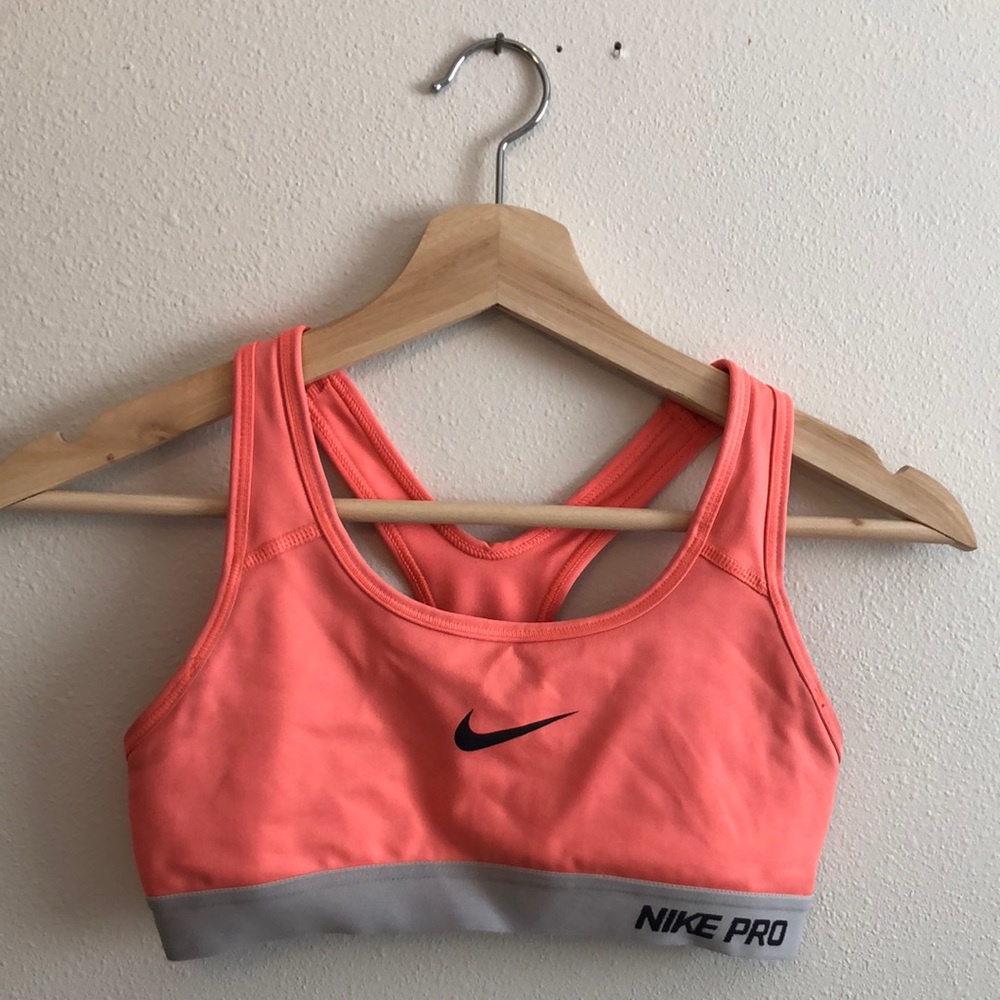 Neon pink Nike sports bra